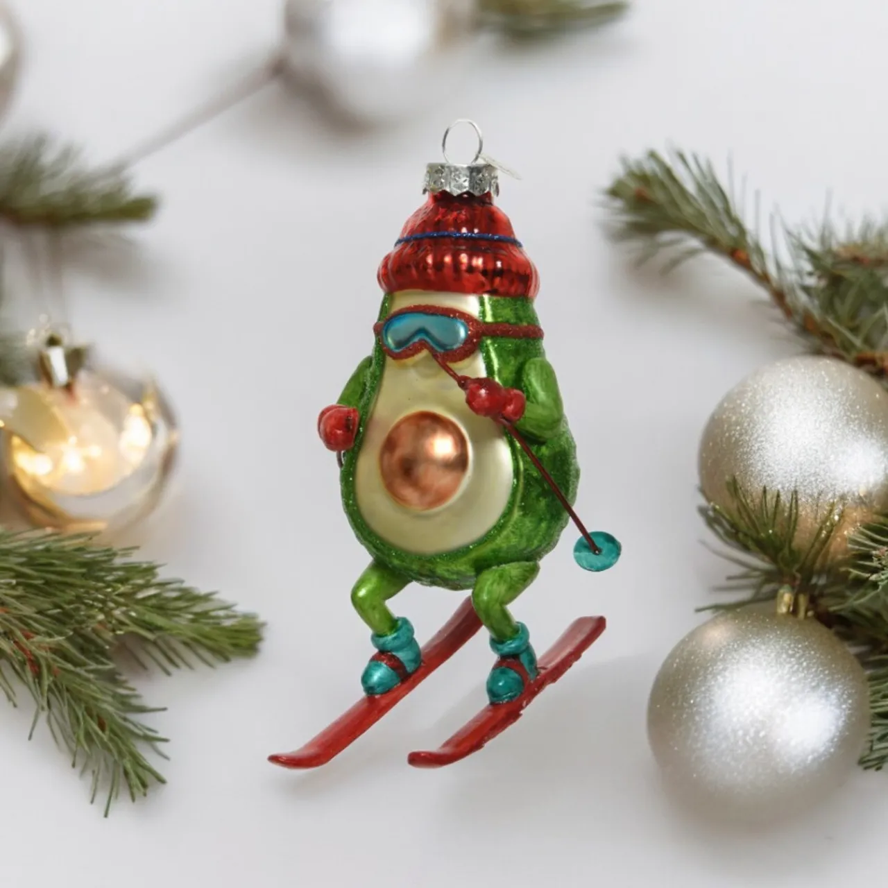 Glass Skiing Avocado Ornament< Sale